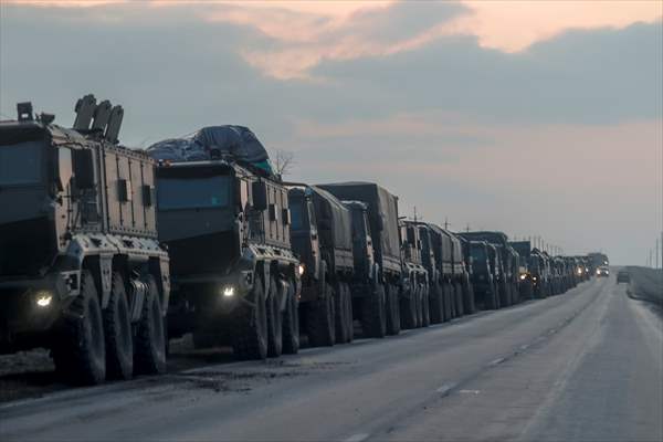 A convoy of Russian military vehicles moving towards border in Donbas region