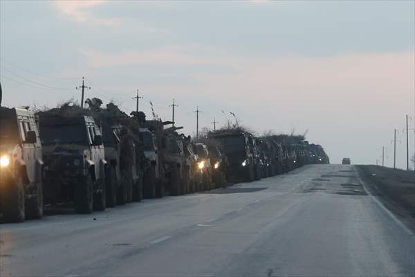 A convoy of Russian military vehicles moving towards border in Donbas region