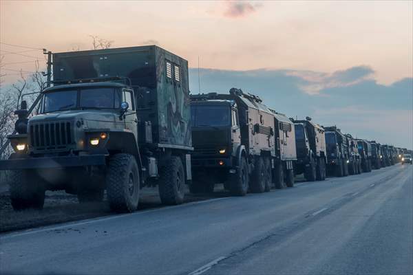 A convoy of Russian military vehicles moving towards border in Donbas region