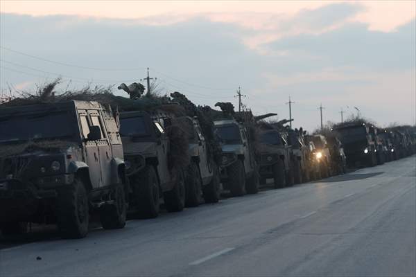 A convoy of Russian military vehicles moving towards border in Donbas region