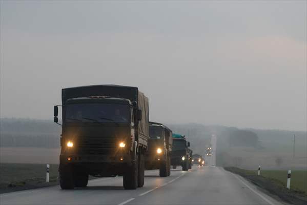A convoy of Russian military vehicles moving towards border in Donbas region