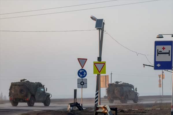 A convoy of Russian military vehicles moving towards border in Donbas region