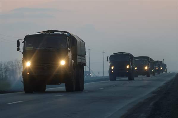A convoy of Russian military vehicles moving towards border in Donbas region