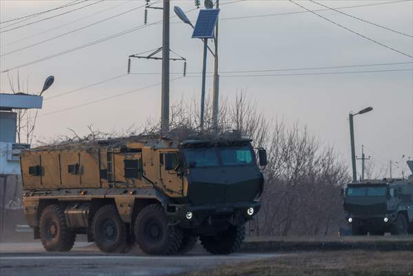 A convoy of Russian military vehicles moving towards border in Donbas region