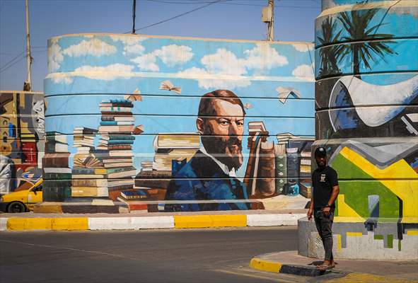 The walls of Baghdad are colored by murals of Iraqi artists