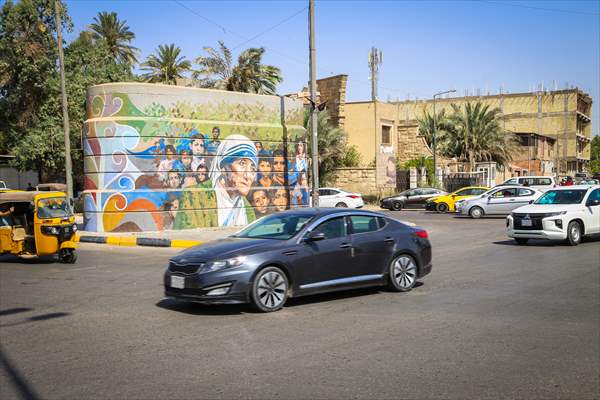 The walls of Baghdad are colored by murals of Iraqi artists
