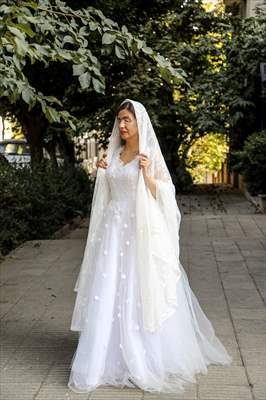 Acid attack victims model for Iranian fashion designer