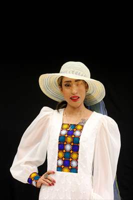 Acid attack victims model for Iranian fashion designer