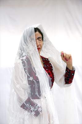 Acid attack victims model for Iranian fashion designer