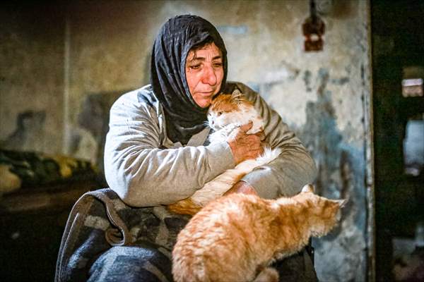 Syrian woman takes care of her cats despite difficult conditions in Idlib