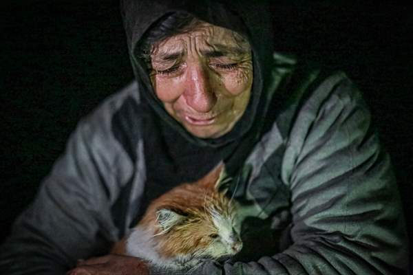 Syrian woman takes care of her cats despite difficult conditions in Idlib