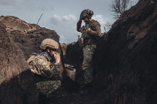 Ukrainian servicemen on the frontline in Bakhmut