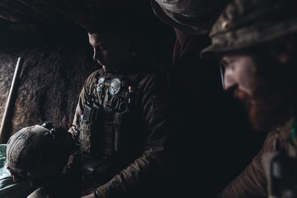 Ukrainian servicemen on the frontline in Bakhmut