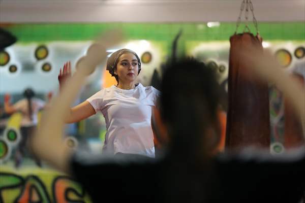 Iranian female trainer's passion for kick-boxing