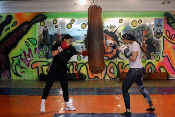 Iranian female trainer's passion for kick-boxing