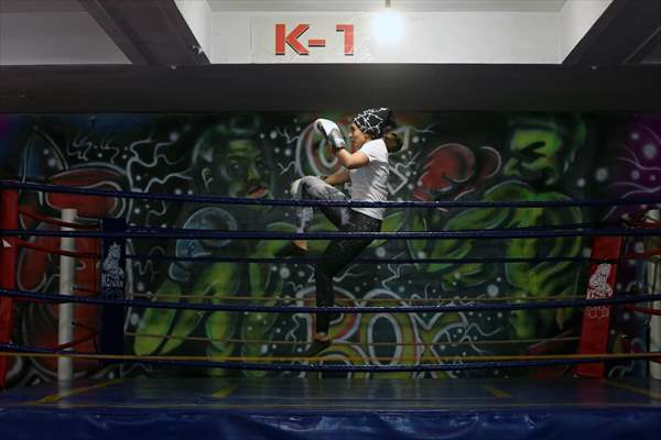 Iranian female trainer's passion for kick-boxing