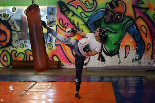 Iranian female trainer's passion for kick-boxing