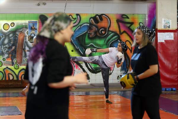 Iranian female trainer's passion for kick-boxing