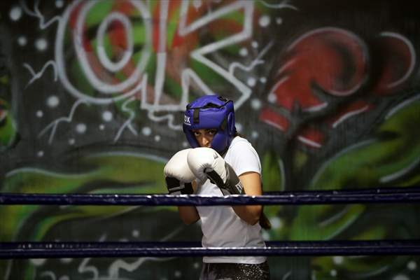 Iranian female trainer's passion for kick-boxing