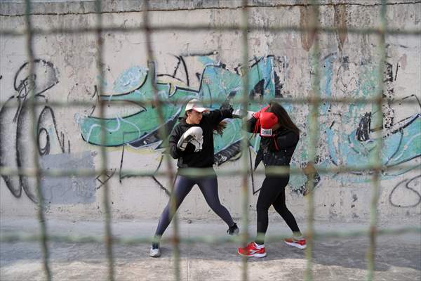 Iranian female trainer's passion for kick-boxing