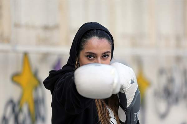 Iranian female trainer's passion for kick-boxing