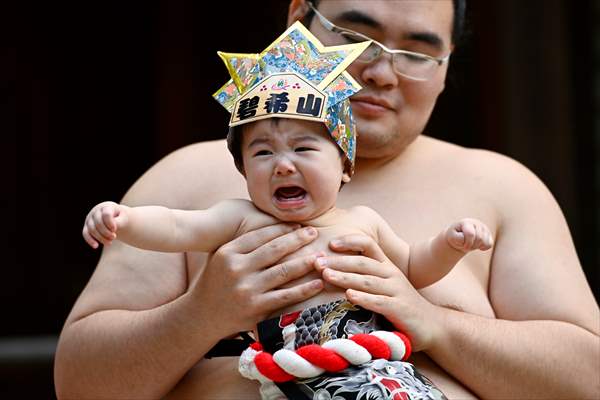 Festival of crying baby sumo in Tokyo