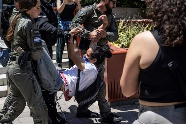 Israeli demonstrators demand Berlin administration cut arms exports to Israel in Tel Aviv