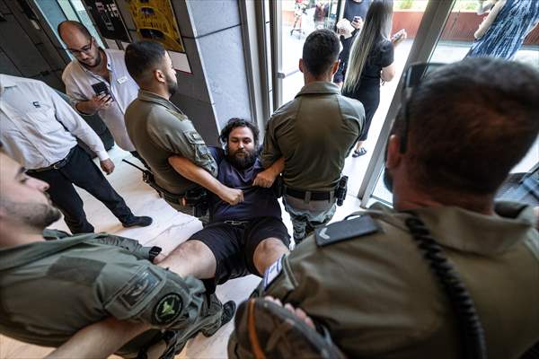 Israeli demonstrators demand Berlin administration cut arms exports to Israel in Tel Aviv