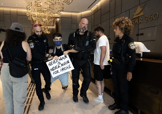 Israeli demonstrators demand Berlin administration cut arms exports to Israel in Tel Aviv