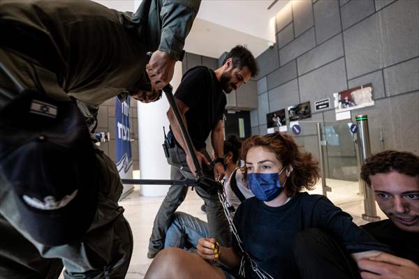 Israeli demonstrators demand Berlin administration cut arms exports to Israel in Tel Aviv