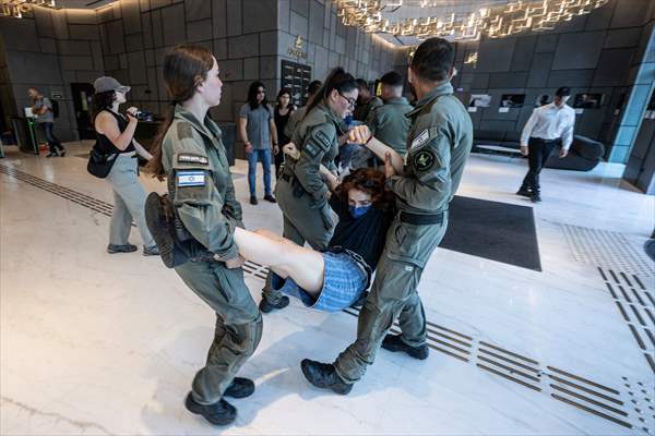 Israeli demonstrators demand Berlin administration cut arms exports to Israel in Tel Aviv