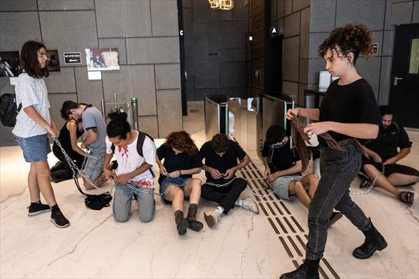 Israeli demonstrators demand Berlin administration cut arms exports to Israel in Tel Aviv