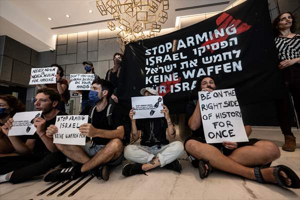 Israeli demonstrators demand Berlin administration cut arms exports to Israel in Tel Aviv