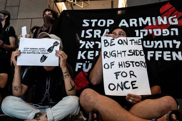 Israeli demonstrators demand Berlin administration cut arms exports to Israel in Tel Aviv