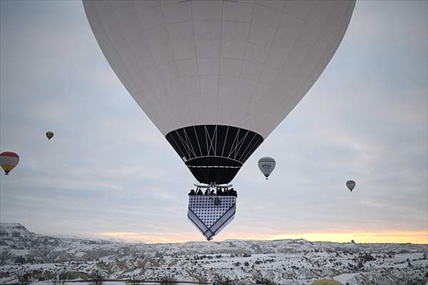 Hot air balloons with 'Palestinian keffiyeh' pattern rise above Cappadocia