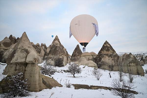 Hot air balloons with 'Palestinian keffiyeh' pattern rise above Cappadocia