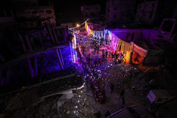 First sahur meal among the collapsed houses in Khan Yunis