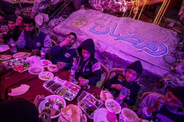 First sahur meal among the collapsed houses in Khan Yunis