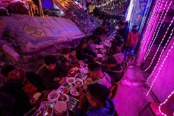 First sahur meal among the collapsed houses in Khan Yunis