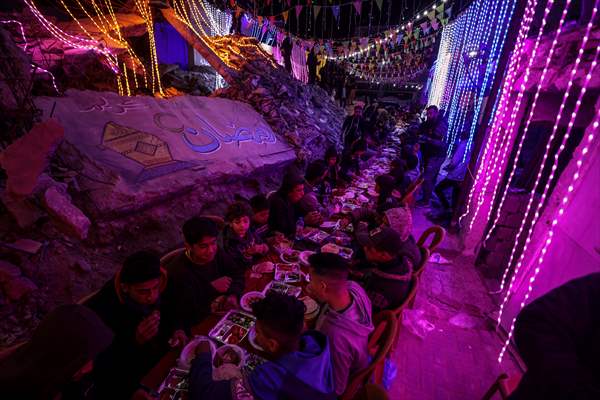 First sahur meal among the collapsed houses in Khan Yunis