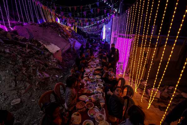 First sahur meal among the collapsed houses in Khan Yunis