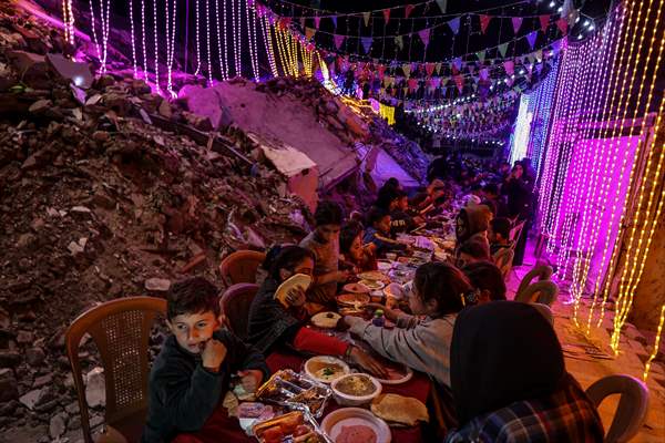 First sahur meal among the collapsed houses in Khan Yunis