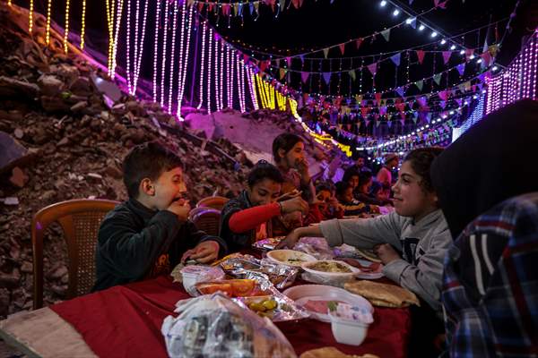 First sahur meal among the collapsed houses in Khan Yunis