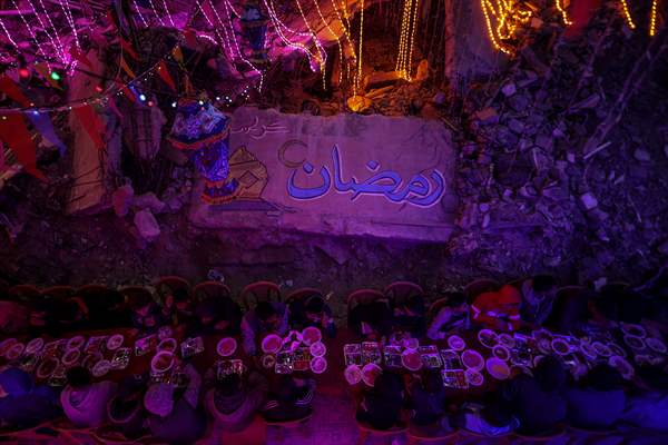 First sahur meal among the collapsed houses in Khan Yunis