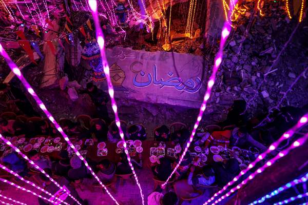 First sahur meal among the collapsed houses in Khan Yunis