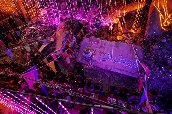First sahur meal among the collapsed houses in Khan Yunis