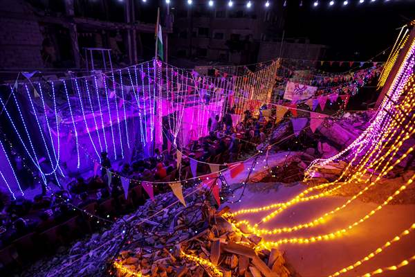 First sahur meal among the collapsed houses in Khan Yunis