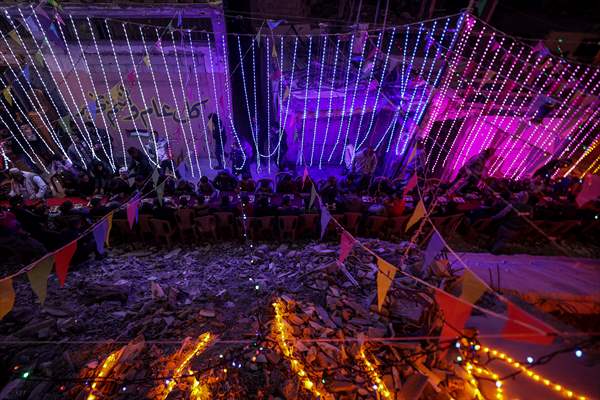 First sahur meal among the collapsed houses in Khan Yunis