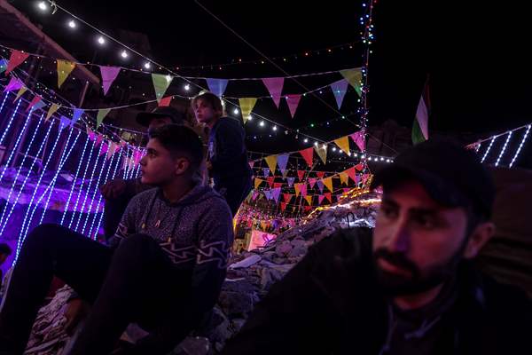 First sahur meal among the collapsed houses in Khan Yunis