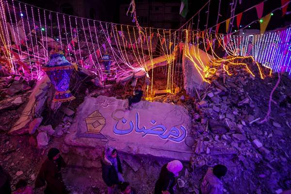 First sahur meal among the collapsed houses in Khan Yunis